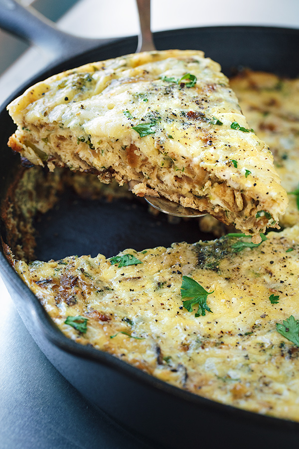 Slice of Breakfast Frittata in Skillet | thecozyapron.com