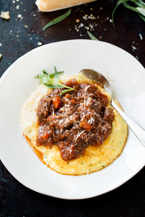 Braised Oxtails over Herb Polenta | thecozyapron.com