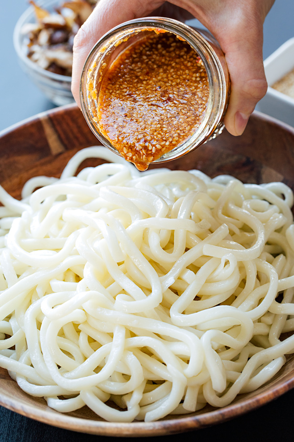 Garlic and Sesame Dressing poured over Udon Noodles  | thecozyapron.com