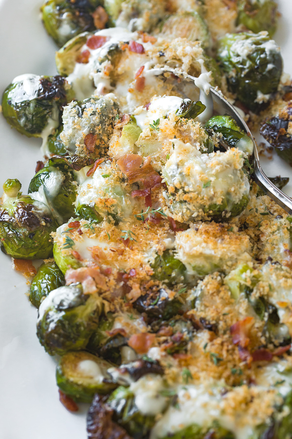 Roasted Brussels Sprouts with Creamy Parmesan Sauce and Bacon | thecozyapron.com
