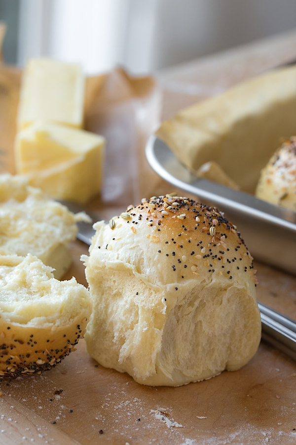 Homemade Rolls with Everything Seasoning on Bread Board | thecozyapron.com