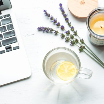 Morning ritual with lemon water and a candle