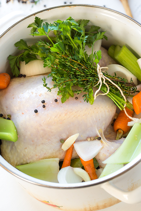 Chicken Broth ingredients in a Pot | thecozyapron.com
