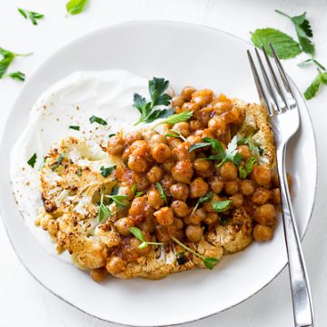 Cauliflower Steaks with Harissa Chickpeas | thecozyapron.com
