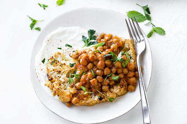 A single serving of Cauliflower Steaks with Harissa Chickpeas | thecozyapron.com