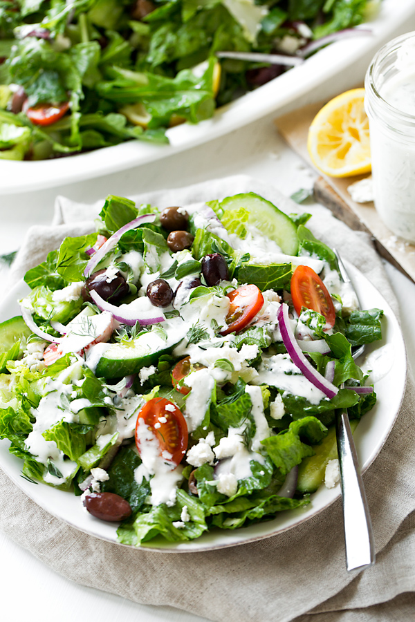 A serving of Greek Salad topped with Creamy Lemon Dressing | thecozyapron.com