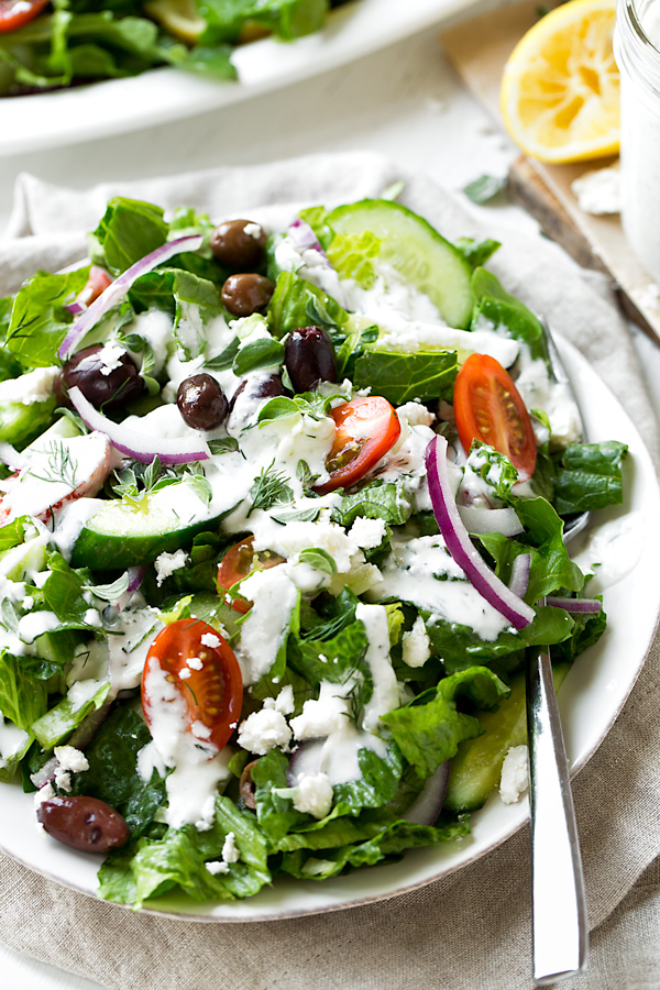 A serving of Greek Salad topped with Creamy Lemon Dressing | thecozyapron.com
