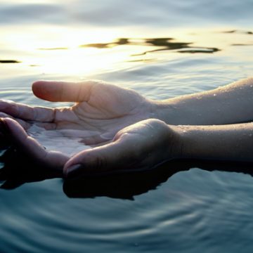 Hands offering water