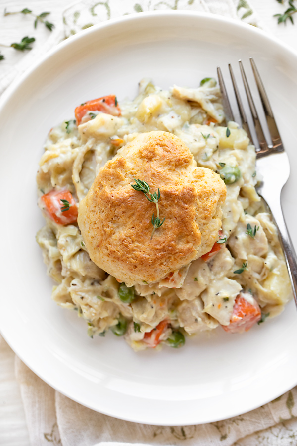 Chicken Pot Pie with Biscuits on a Plate | thecozyapron.com