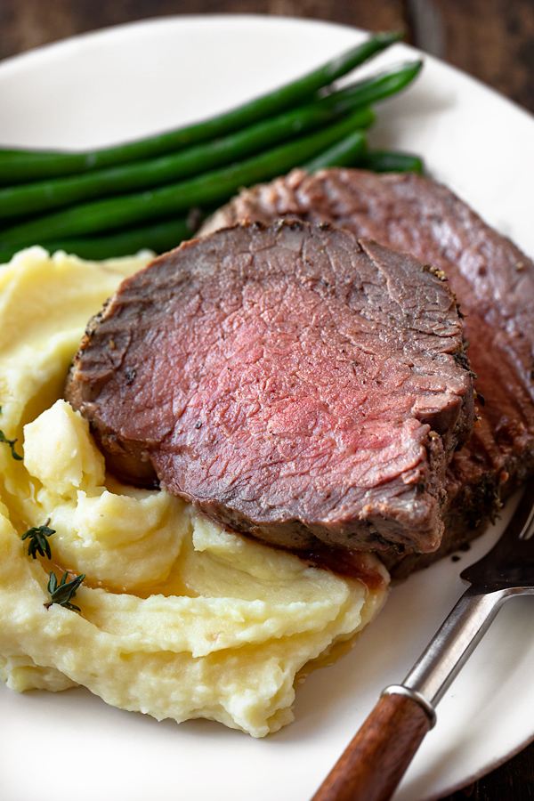 Beef Tenderloin with Herb-Pepper Crust with Mashed Potatoes | thecozyapron.com