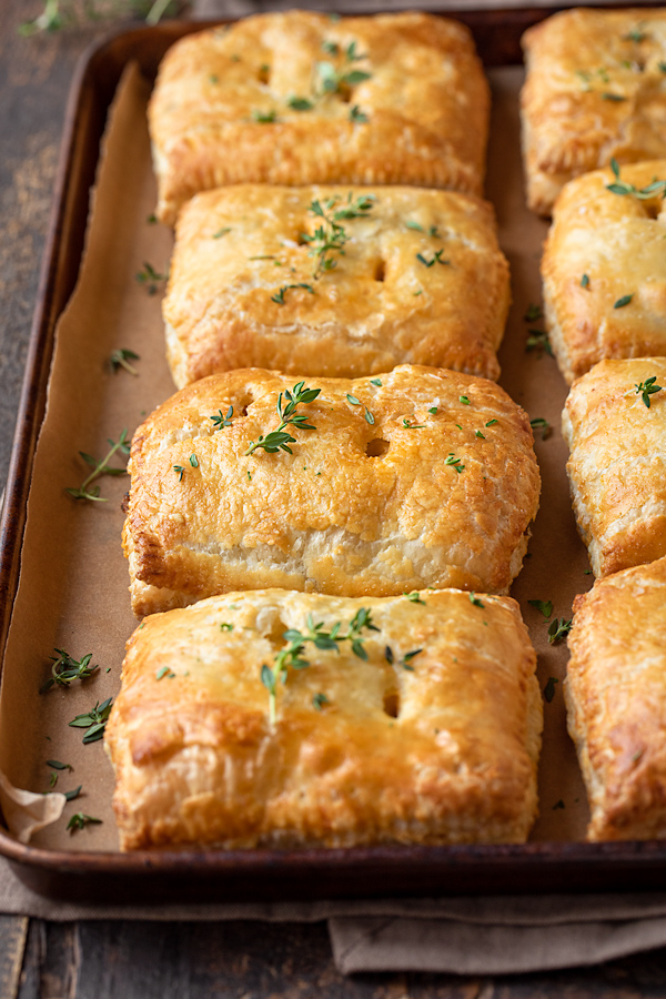 Savory Hand Pies on a Baking Sheet | thecozyapron.com