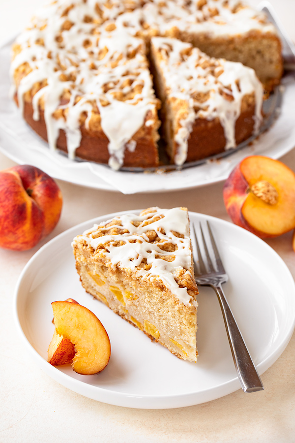Slice of Peaches and Cream Coffee Cake | thecozyapron.com