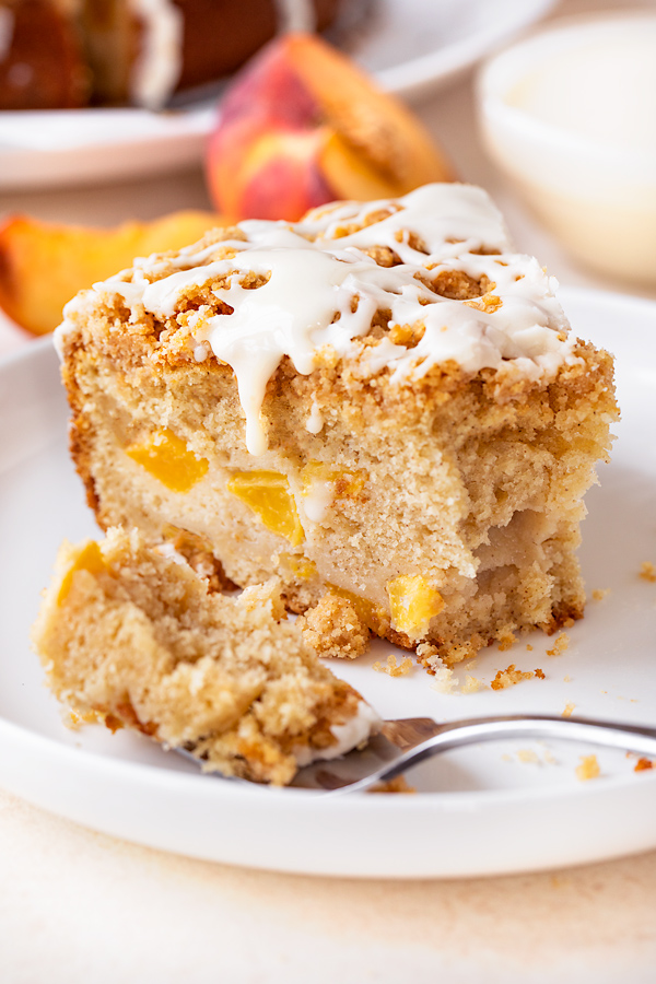 Peaches and Cream Coffee Cake with Sour Cream Drizzle | thecozyapron.com