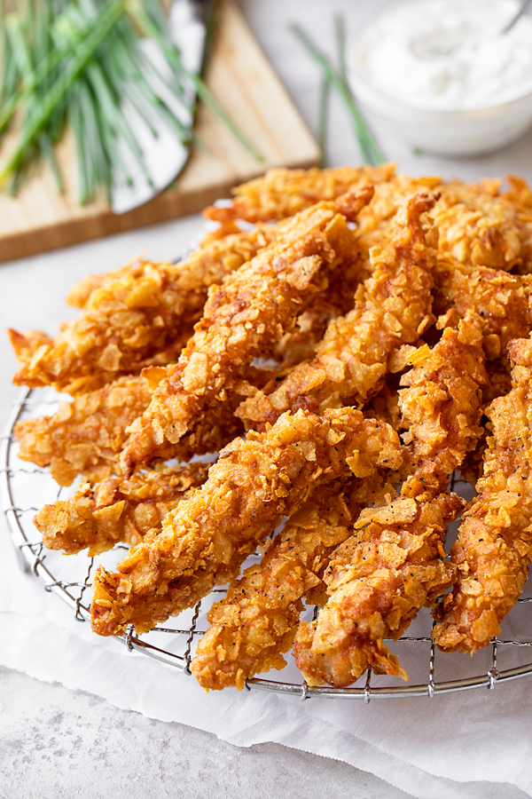 Potato Chip Chicken Strips on a Wire Rack | thecozyapron.com