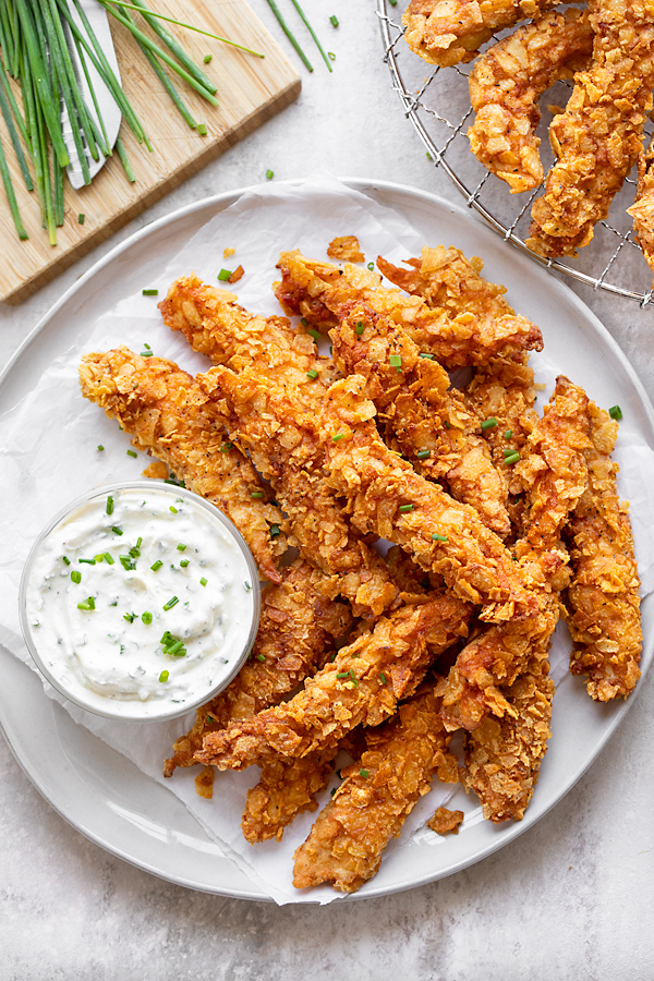 Potato Chip Chicken Strips with Sour Cream and Onion Ranch Dipping Sauce | thecozyapron.com