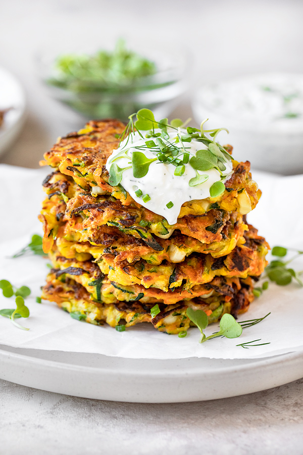 Stacked Zucchini Fritters with Herb Yogurt Sauce | thecozyapron.com