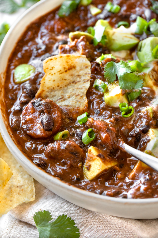 Spoonful of Black Bean Soup with Spanish Chorizo | thecozyapron.com