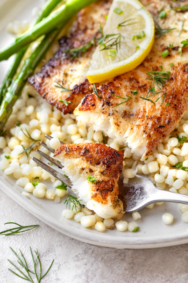 Flaky Tilapia with Lemon and Herbs | thecozyapron.com
