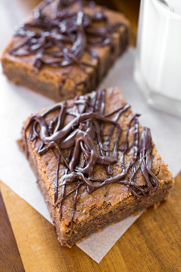Chocolate Peanut Butter Bars with a glass of milk | thecozyapron.com