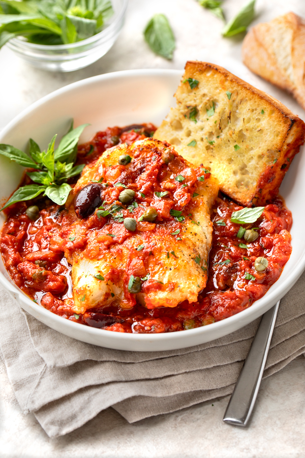 Baked Cod in Spicy Tomato Sauce | thecozyapron.com