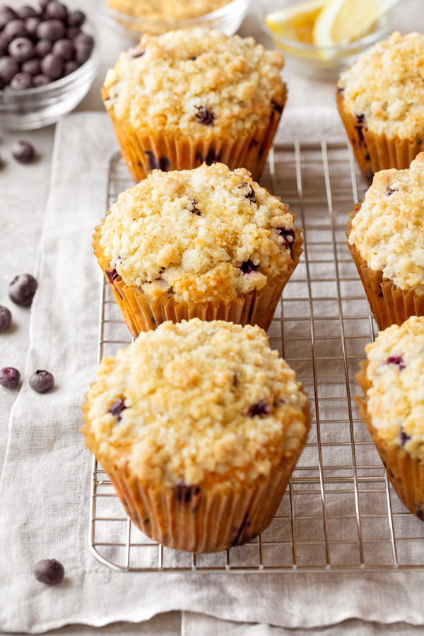 Lemon Blueberry Muffins Cooling on a Wire Rack | thecozyapron.com