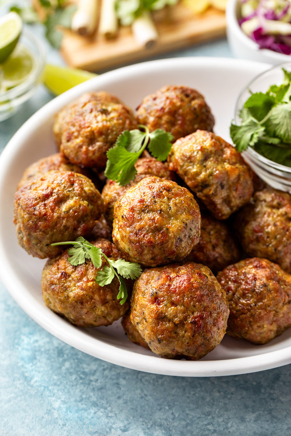 A bowlful of Pork Meatballs with Ginger and Lemongrass | thecozyapron.com